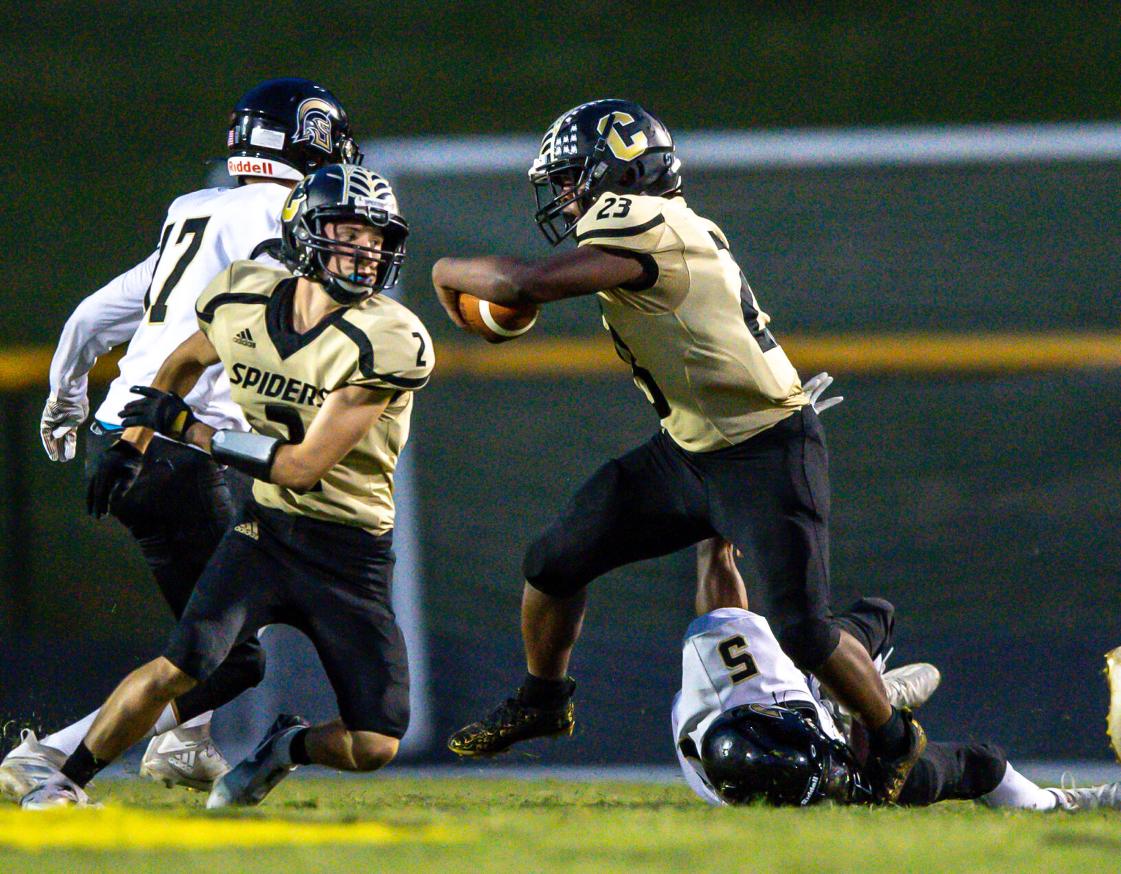 The Warriors dominated the Spiders 49-21.
